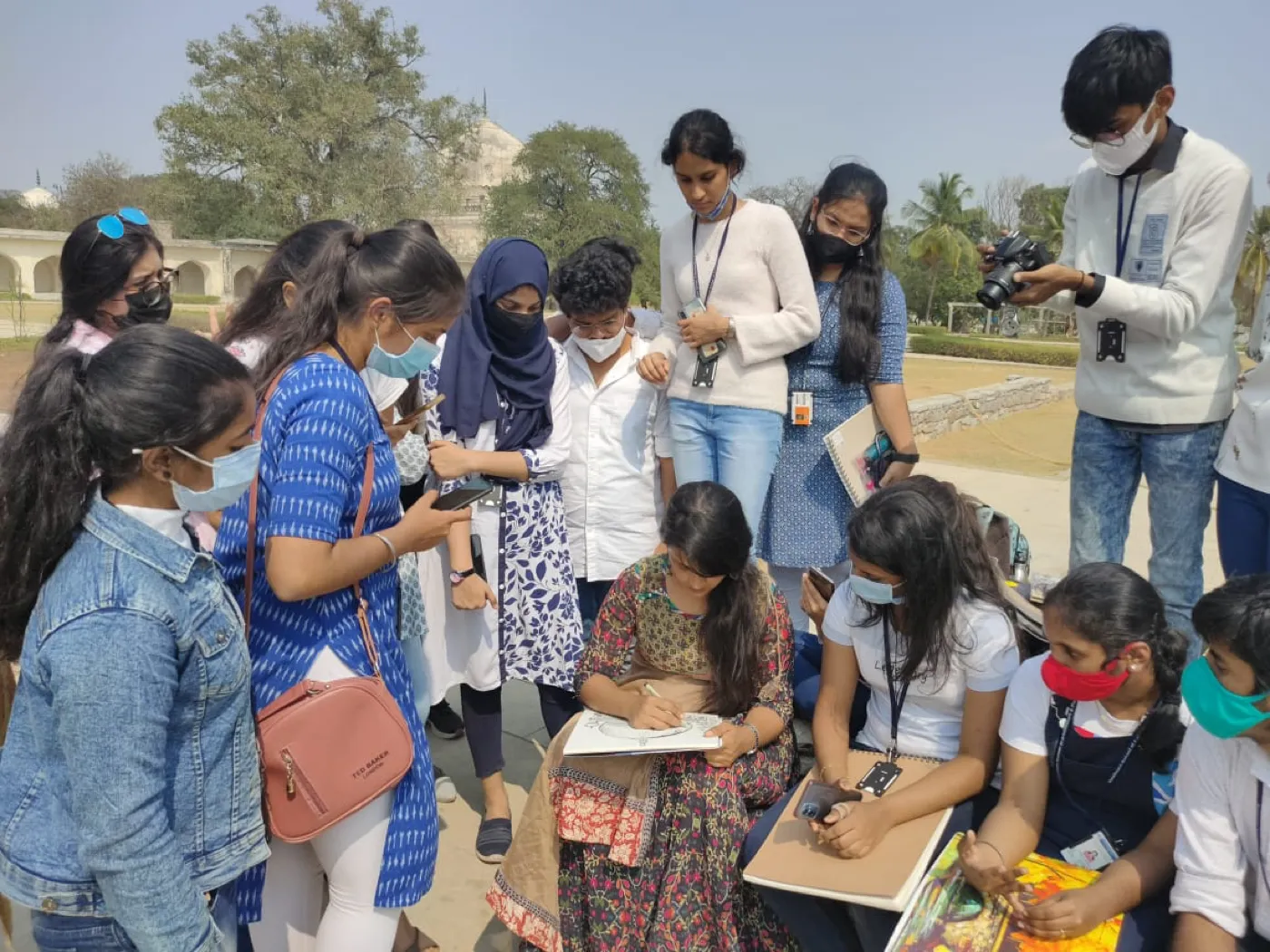 Students sketching together outdoors