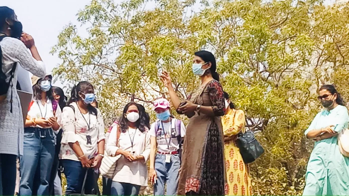 Naishitha talking to a group of students